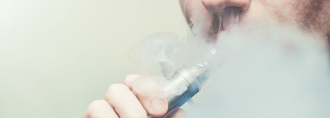 Close up of a man vaping